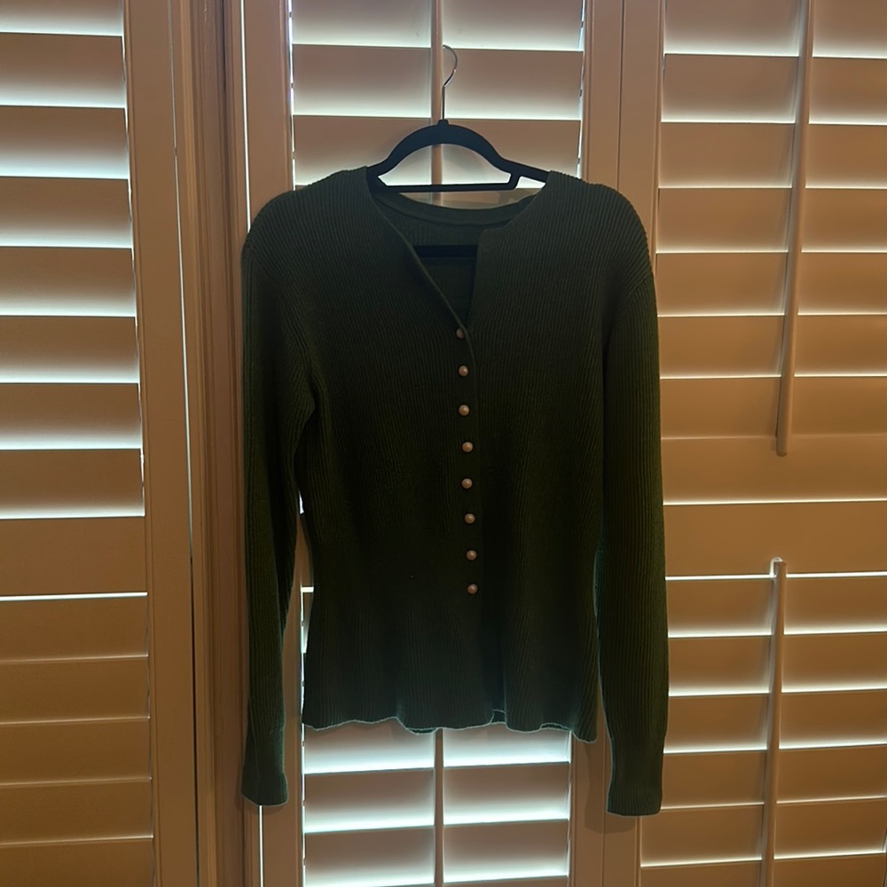 Kelly green sweater with buttons and ruffle bottom